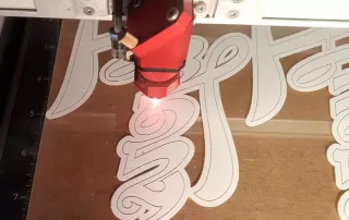 Laser cut printed acrylic