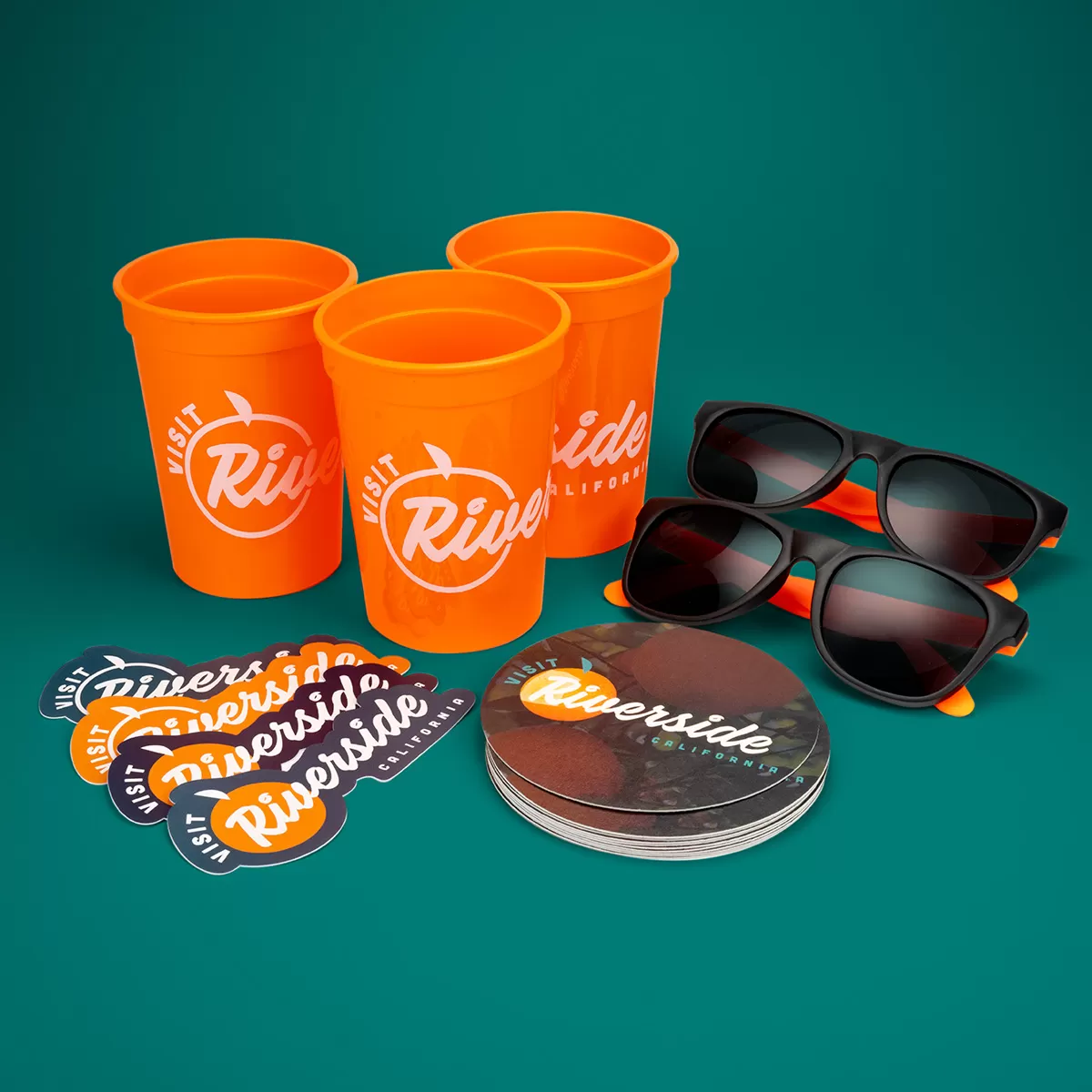 Promotional Products: Visit Riverside (Cups, Sunglasses, Stickers, Coasters)